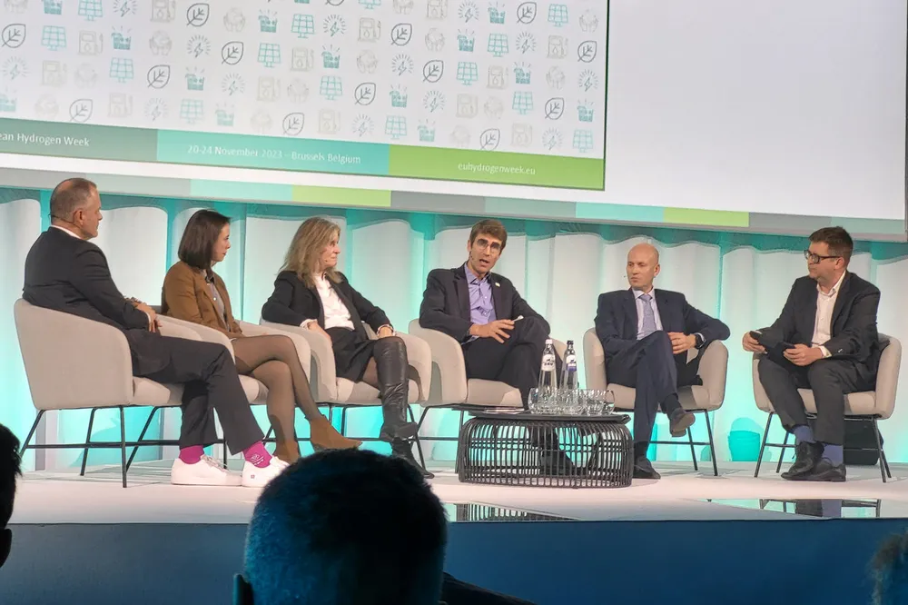John Cockerill Hydrogen CEO Raphael Tilot speaking at European Hydrogen Week. (l-r) Thyssenkrupp Nucera CEO Werner Ponikar; Enapter CCO Vaitea Cowan; Kerstin Jorna, director-general of DG-Grow; Tilot; Nel CEO Håkon Volldal; and moderator Ed Bretherton of law firm Clifford Chance.