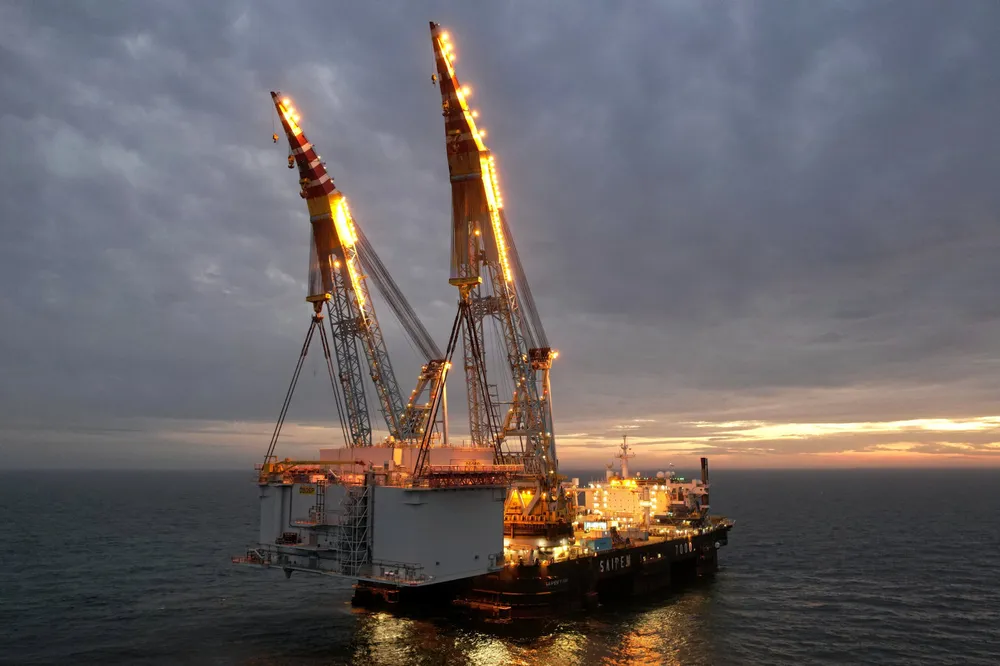 A HVDC offshore substation platform is installed on the UK's Dogger Bank wind farm by the Saipem 7000 vessel.