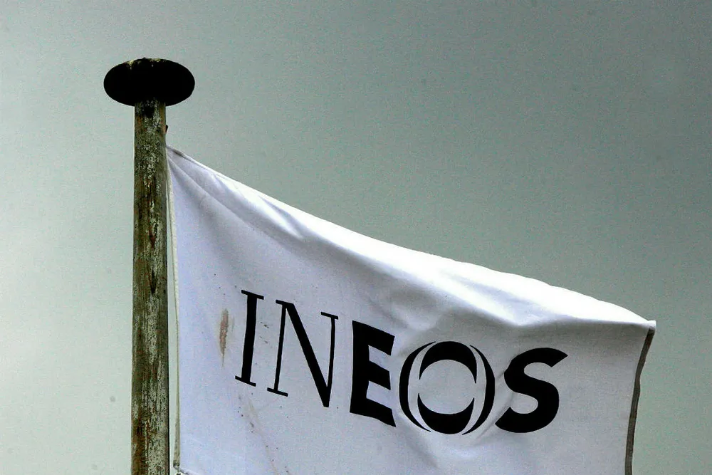 FILE PHOTO: An INEOS flag flies above an oil refinery building in Grangemouth, central Scotland April 28, 2008. REUTERS/David Moir/File Photo . .