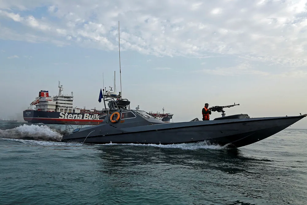 Middle East tensionL: a boat of the Iranian Revolutionary Guard sails next to Stena Impero, a British-flagged vessel owned by Stena Bulk