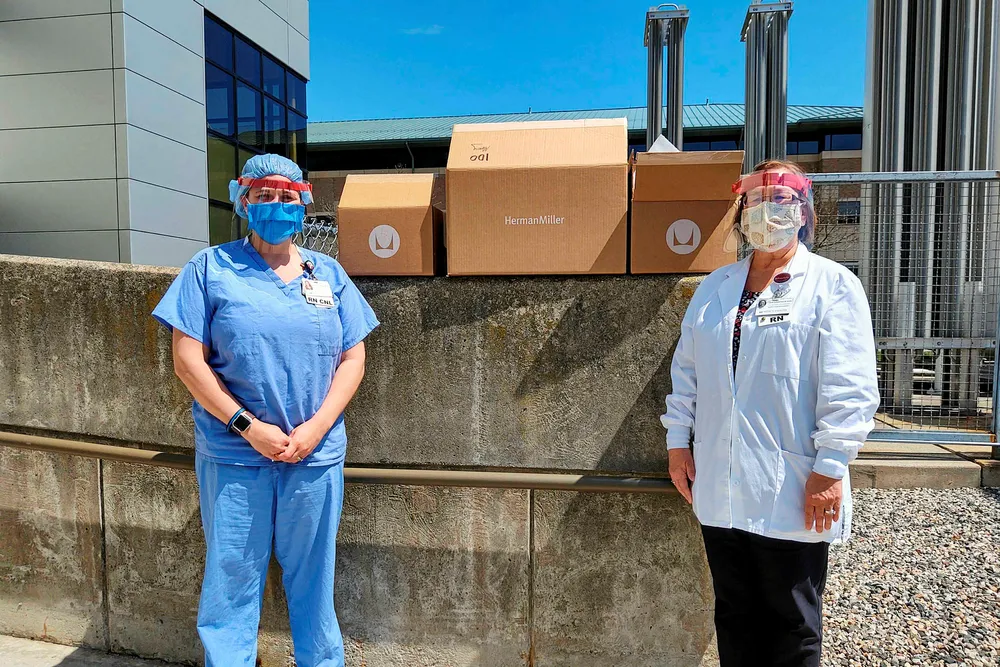 Protection: nurses Sara Simon (left) and Deborah Anderson (right) of Mercy Healthy with their new face shields donated by Herman Miller/Herman Miller Cares and Ineos