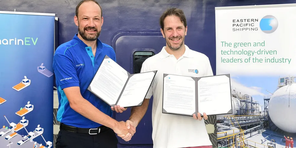 MarinEV’s Jan-Viggo Johansen (left) and Eastern Pacific’s Cyril Ducau announce their collaboration on board the Hydromover, Singapore’s first fully electric cargo vessel.