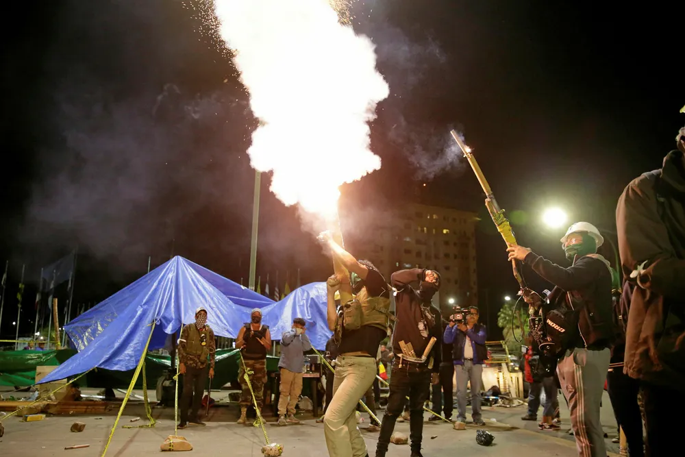Fireworks: Supporters took to the streets to celebrate after Bolivian Senator Jeanine Anez declared herself Bolivia's interim president.