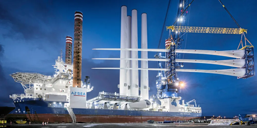 Blades are loaded onto wind turbine installation vessel in the UK