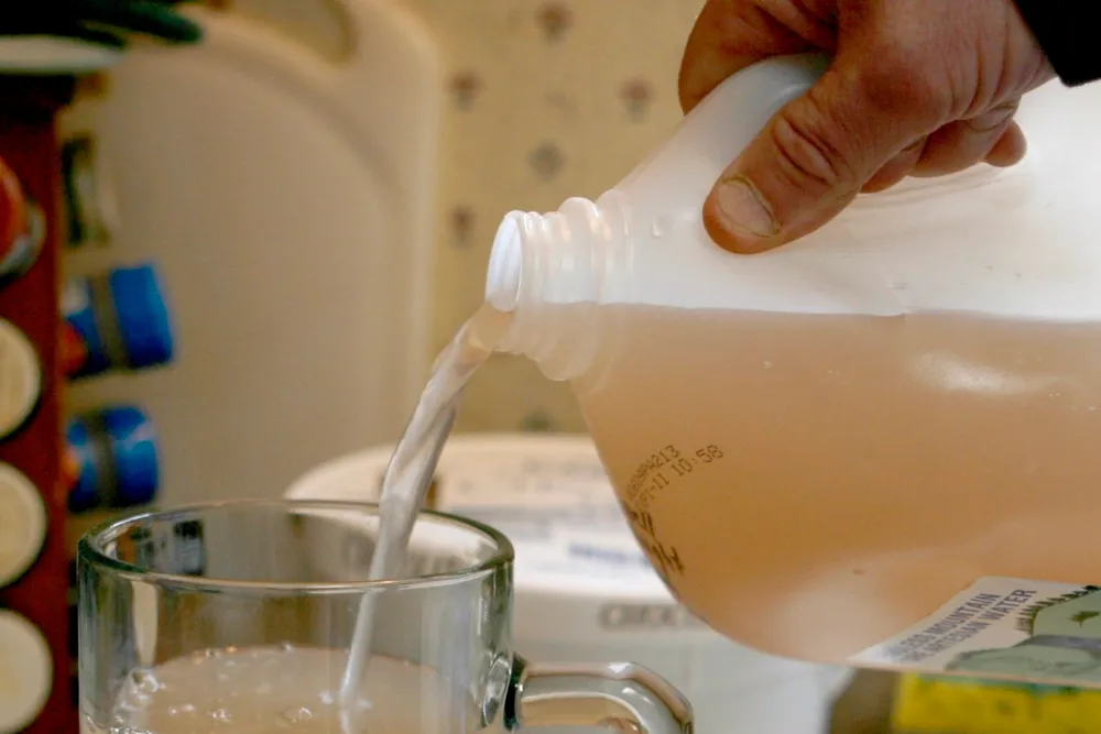 Don't drink the water?: a Dimock resident pours a water sample after shale gas drilling started in 2009