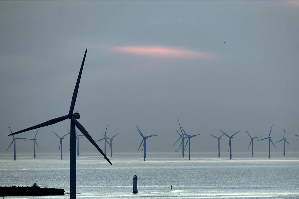 Offshore wind powerhouse: New Brighton lighthouse is pictured at sunset, in New Brighton, at the mouth of the river Mersey, in north-west England
