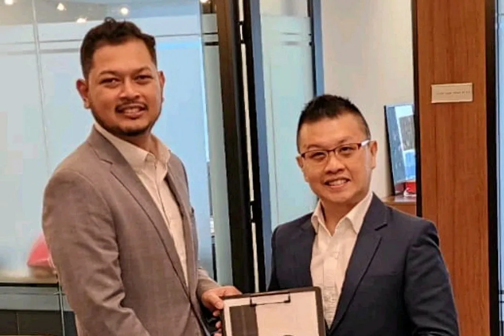 Mohammad Shahil, chairman of Semarak Renewable Energy, and Willy Lim, partner at Capitale Ventures.