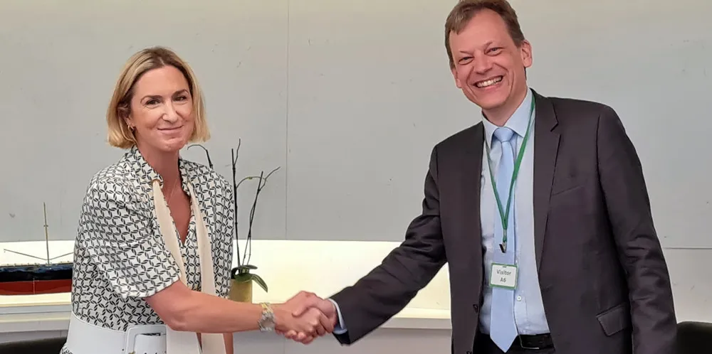 Maran Gas CEO Maria Angelicoussis and Roger Holm, president of Wartsila Marine Power, agree to extend their maintenance agreement.