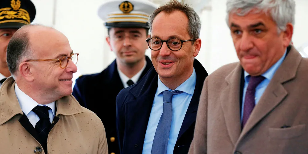 Jerome Pecresse, General Electric Renewable Energy CEO, with French Prime Minister Bernard Cazeneuve (left) and former minister Herve Morin (right) in Cherbourg. Pic: CHARLY TRIBALLEAU/AFP/Getty Images