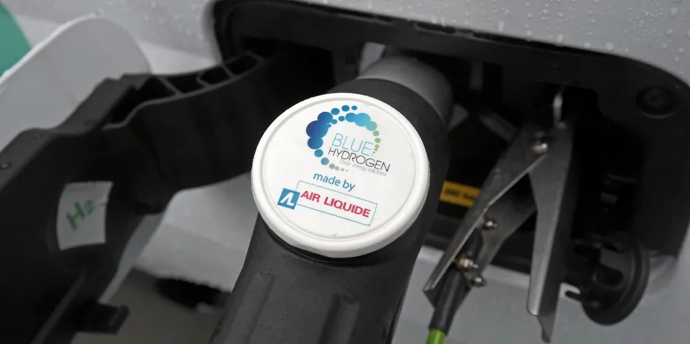 'Blue hydrogen' is pumped into a fuel-cell electric vehicle at a petrol station in France.