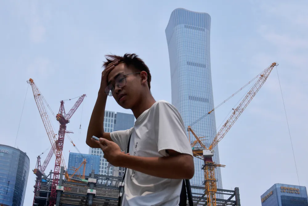Kina-børsene har vist en oppgang de siste månedene. Eiendomsmarkedet ligger fortsatt nede for telling. Her fra Central Business District i Beijing denne uken.