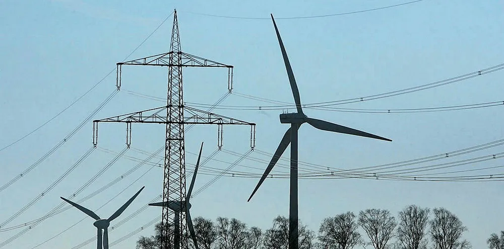 Wind turbines and power lines near Rostock, Germany
