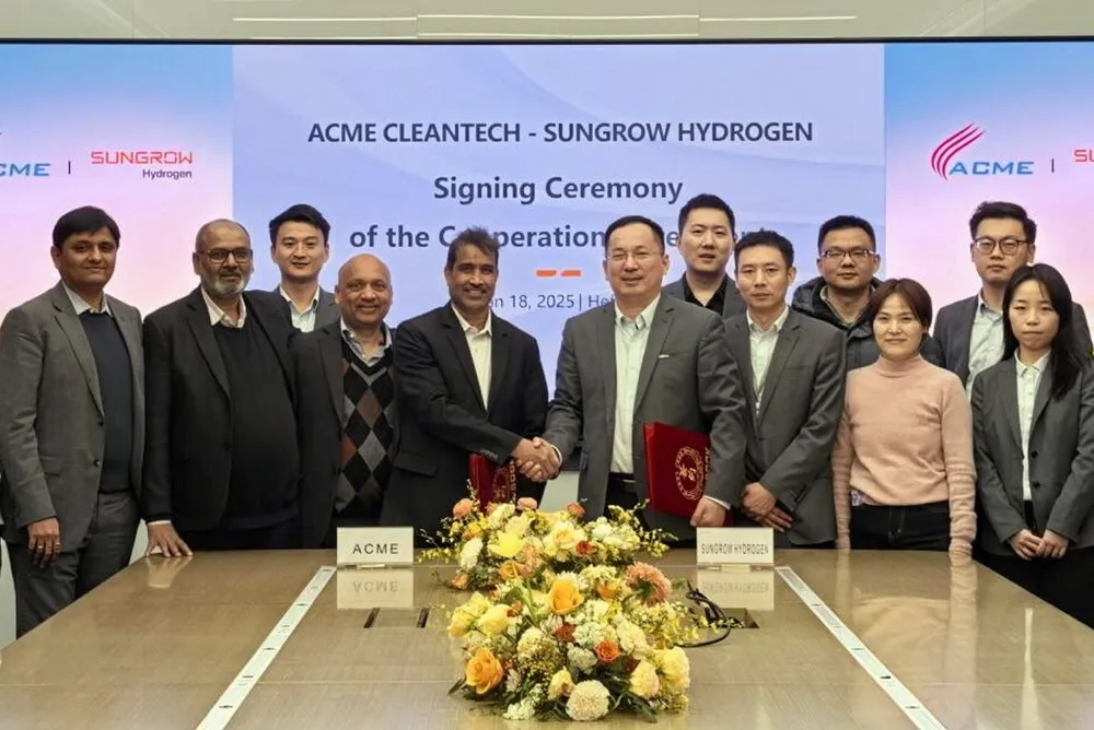 ACME and Sungrow officials at the signing ceremony for the purchase agreement.