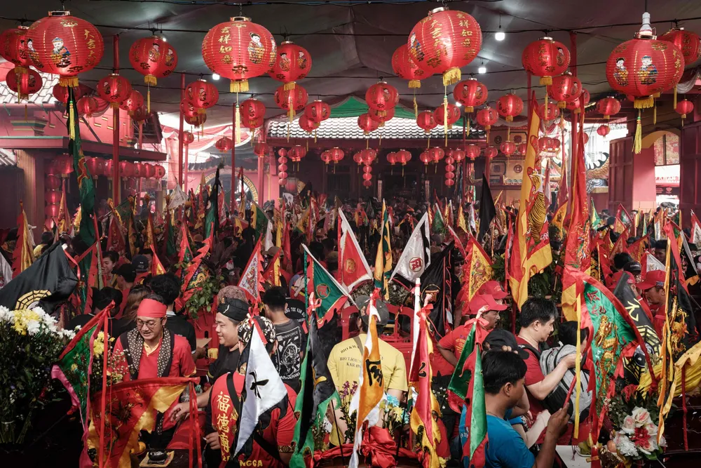People participate in the Cap Go Meh festival at the Guan Yu temple in Karawang, West Java, Indonesia.