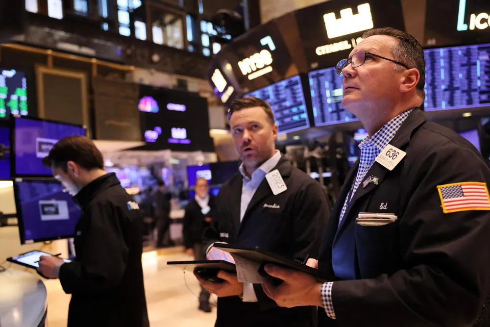 Bank jitters: traders on the floor of the New York Stock Exchange saw fears around the health of European lender Credit Suisse triggering a sell off in equities and commodities on Wednesday.