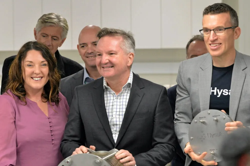 Australian energy minister Chris Bowen (middle) and Hysata CEO Paul Barret (right) at opening of Port Kembla manufacturing facility.