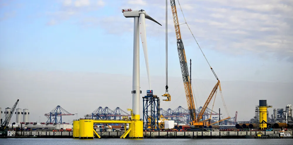 One of the five Kincardine floating wind units, made up of a Principle Power WindFloat platform topped with a 9.5MW Vestas turbine, being assembled in the Port of Rotterdam, the Netherlands, for installation off Scotland