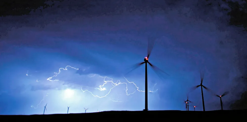 Lightning lights up the sky behind the Nebraska Public Power District's Ainsworth wind farm