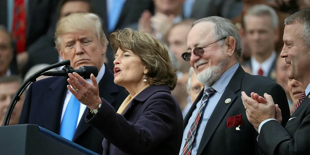 Lisa Murkowski, Alaska's senior senator, delivering remarks in late 2017 next to the US president.