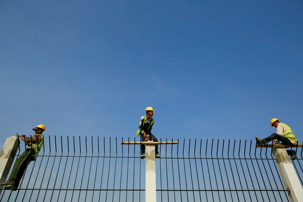 New LNG-to-power project: workers at the Thilawa Special Economic Zone, an hour from Myanmar's commercial capital Yangon