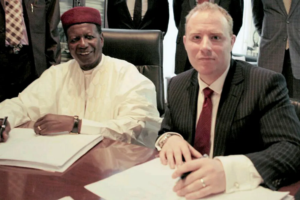 Savannah Petroleum chief executive Andrew Knott (right)