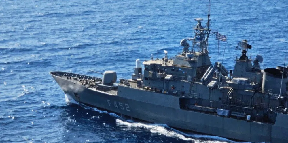 A coalition warship warned the maser of a Maltese-flagged tanker about nearby explosions, said Diaplous