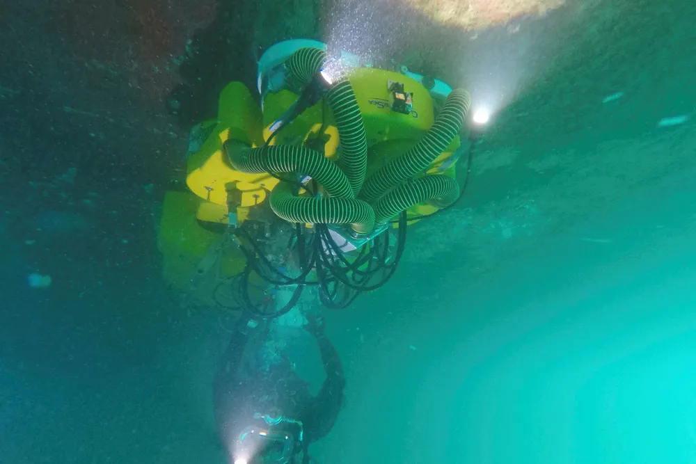 New technology: a diver uses the Envirocart to clean a hull
