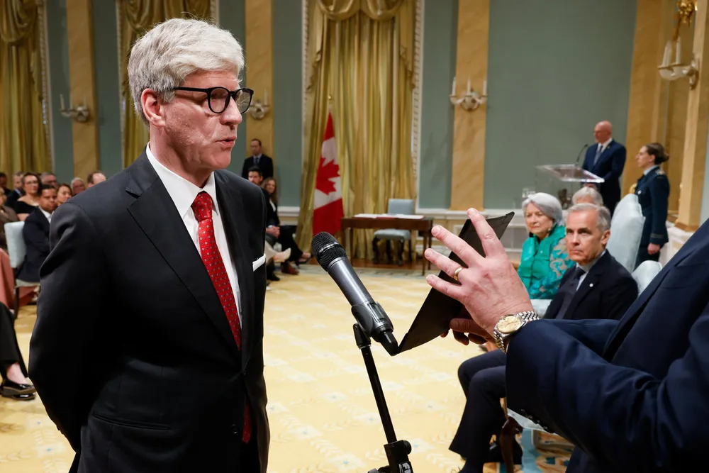 Tim Hodgson swears in as Canada's Minister of Energy and Natural Resources, in Ottawa.