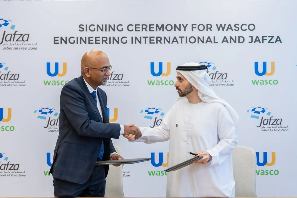 Shan Karupiah, Wasco Energy chief executive, (left) and Abdulla Al Hashmi, chief operating officer, Parks & Zones, DP World GCC (right) at the signing ceremony event between Wasco and Jebel Ali Free Trade Zone (JAZFA).
