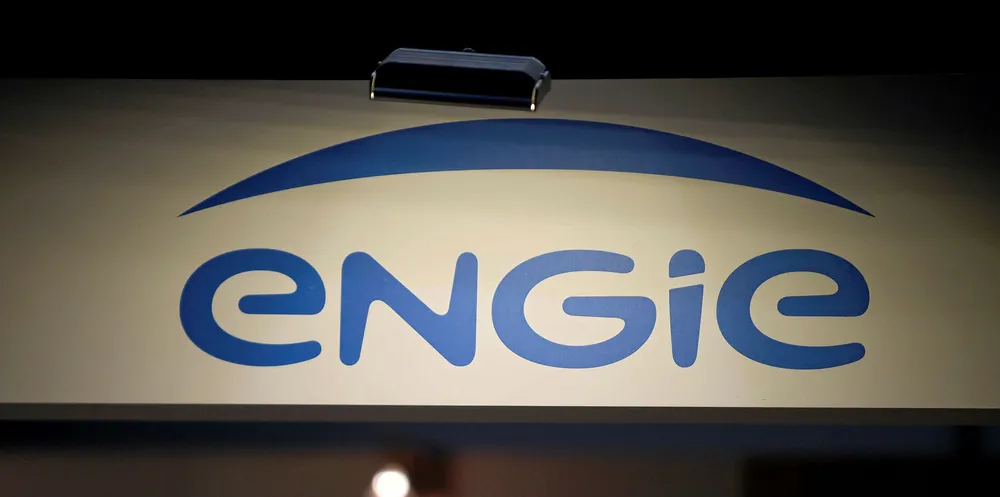 This photograph taken on November 23, 2017, shows the logo of French gas and power group Engie at the Actionaria fair in Paris. / AFP PHOTO / ERIC PIERMONT (Photo credit should read ERIC PIERMONT/AFP/Getty Images) . Engie.