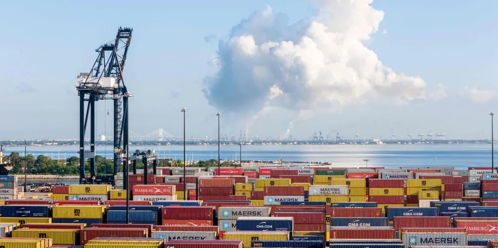 Shipping containers sit at the Port of Houston on Monday as a potential strike by longshoremen looms.