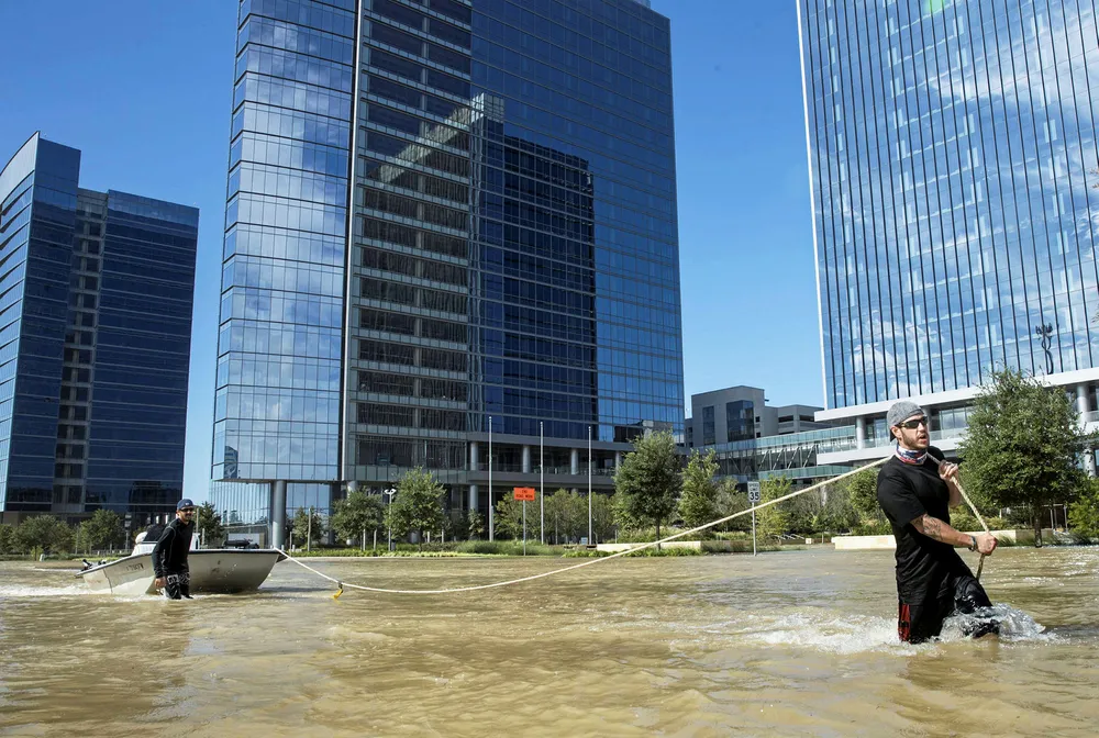 Troubled waters: rescuers from Odessa, Texas make their way along Eldridge Parkway in the Energy Corridor of Houston after Tropical Storm Harvey hit the city
