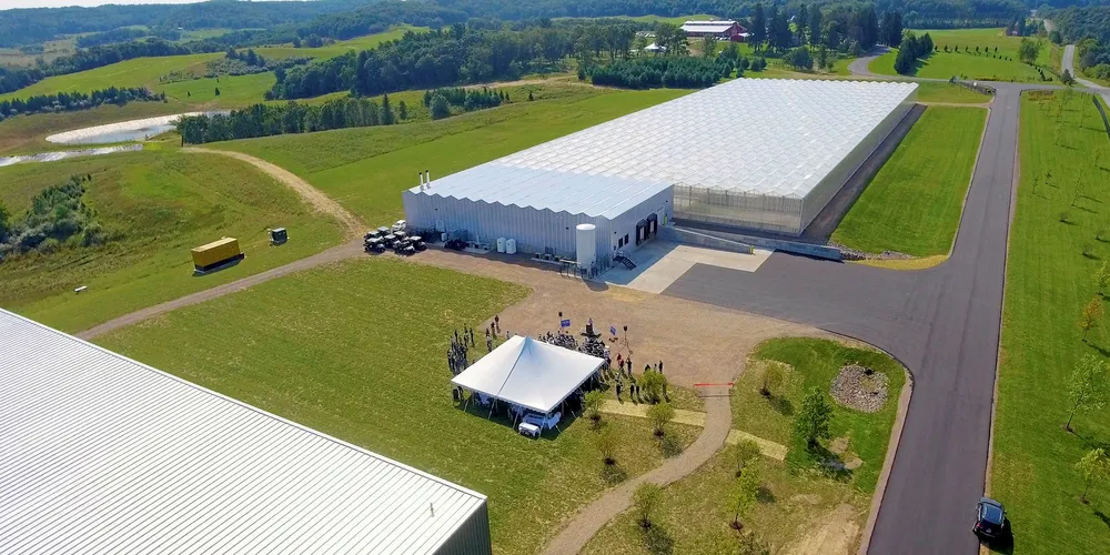 Aerial of Superior Fresh with the fish house in the foreground and greenhouse in background.