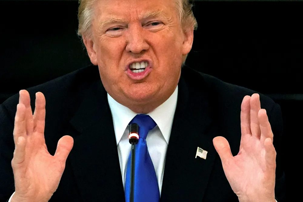 USA-president Donald Trump får det ikke som han vil med innreiseforbudet i denne omgang. Foto: Kevin Lamarque / Reuters / NTB Scanpix