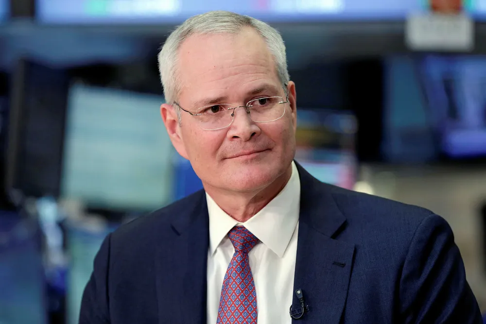 Earnings down: ExxonMobil chief executive Darren Woods