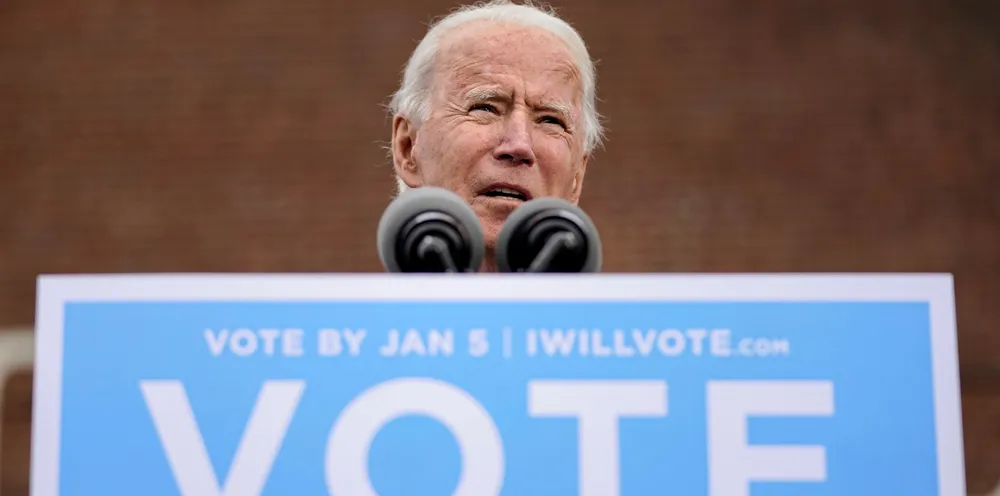 President-elect Joe Biden speaks during a drive-in rally for U.S. Senate candidates Jon Ossoff and Rev. Raphael Warnock in Atlanta, Georgia.