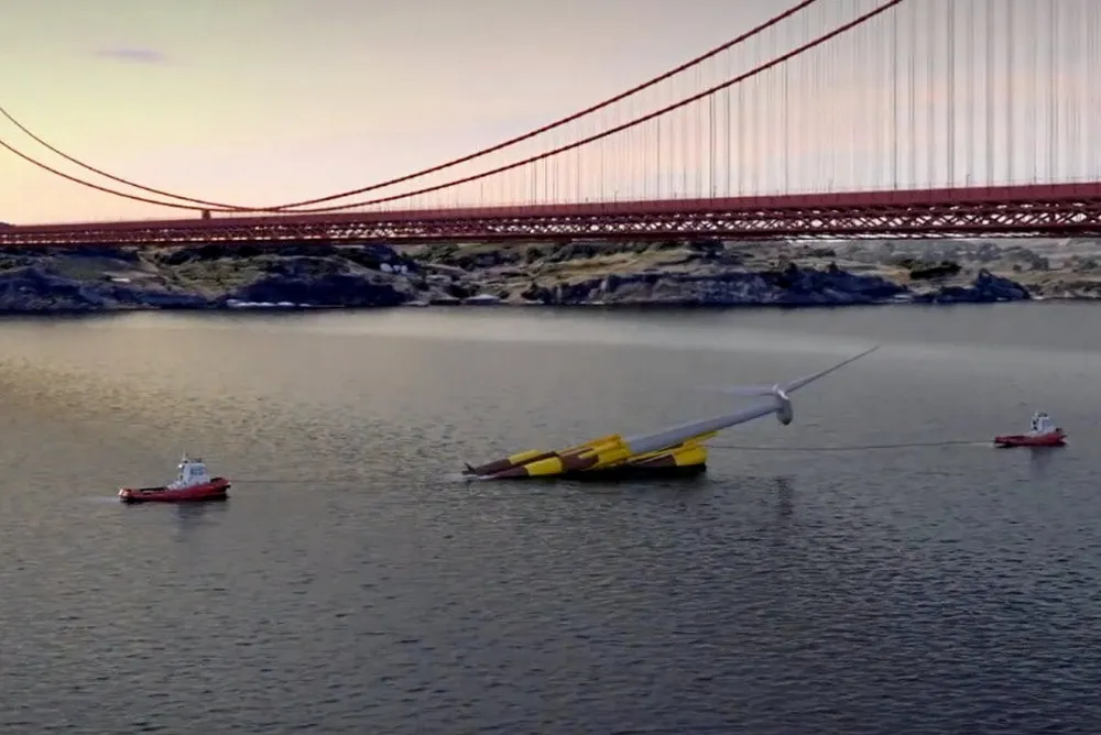 A rendering of the Aikido floating turbine design folded to pass under a bridge.