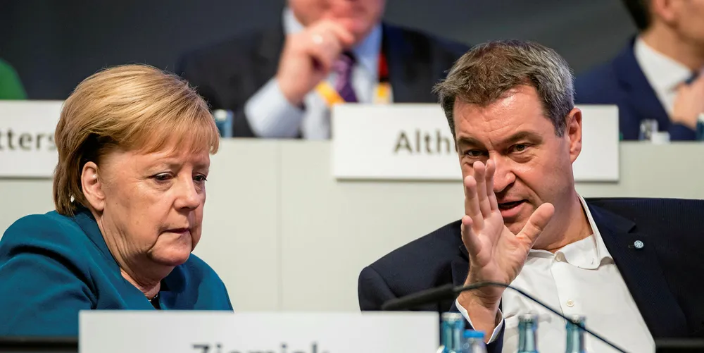 German Chancellor Angela Merkel (l) and Bavarian state premier Markus Söder (r)