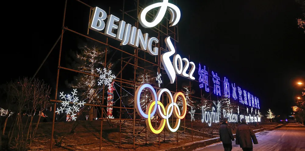 Visitors walks past in front Beijing 2022 Winter Olympics logo on January 19, 2016 in Beijing, China. Chinese cities Beijing and Zhangjiakou won the bid to host the 2022 Winter Olympic Games.