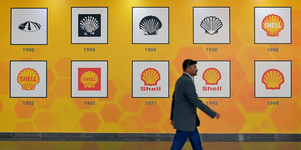 An Indian employee walks through the Shell Technology Centre in Bangalore.