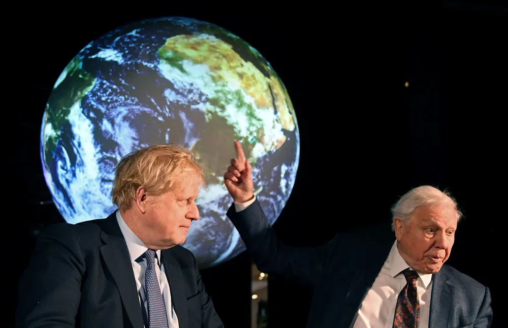 Climate crisis: David Attenborough (right) drafted in by UK Prime Minister Boris Johnson (left) and his government to host COP26