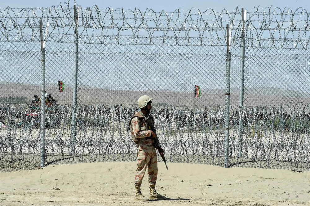 Protection: a member of Pakistan's Frontier Corps stands guard at a newly inaugurated border crossing between Pakistan and Afghanistan in Balochistan province