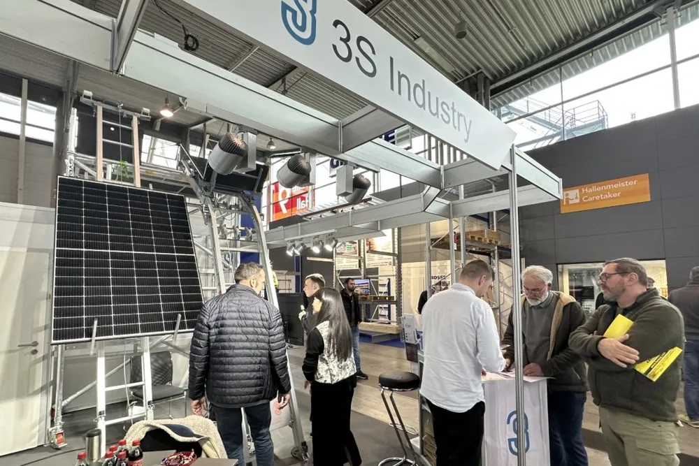 A picture of a 3S stand at a previous conference.