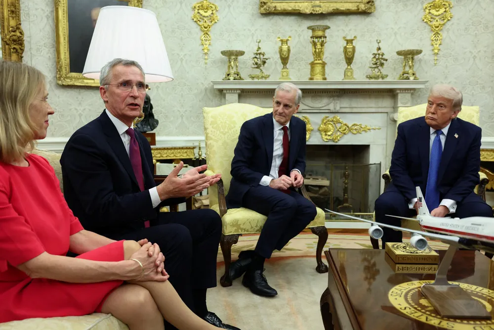 Norway's Finance Minister and former NATO Secretary General Jens Stoltenberg delivers remarks during an Oval Office meeting with Norway's Prime Minister Jonas Gahr Store and US President Donald Trump.