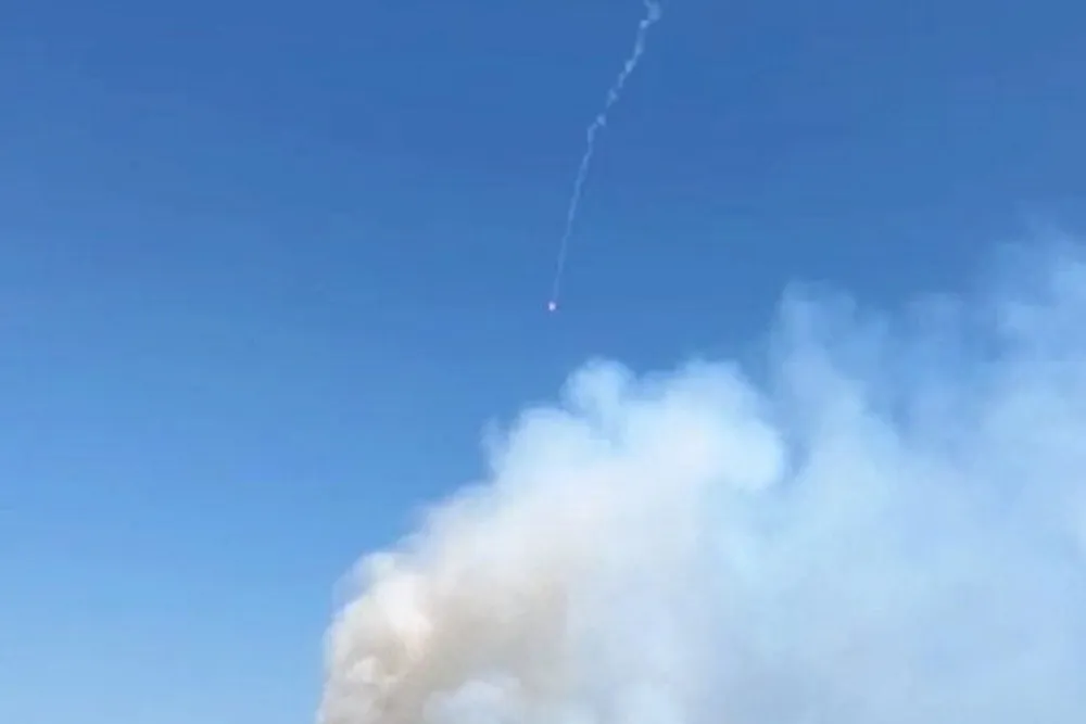 Experiment: a signal flare above a burning well in Kazakhstan, operated by Buzachi Neft.