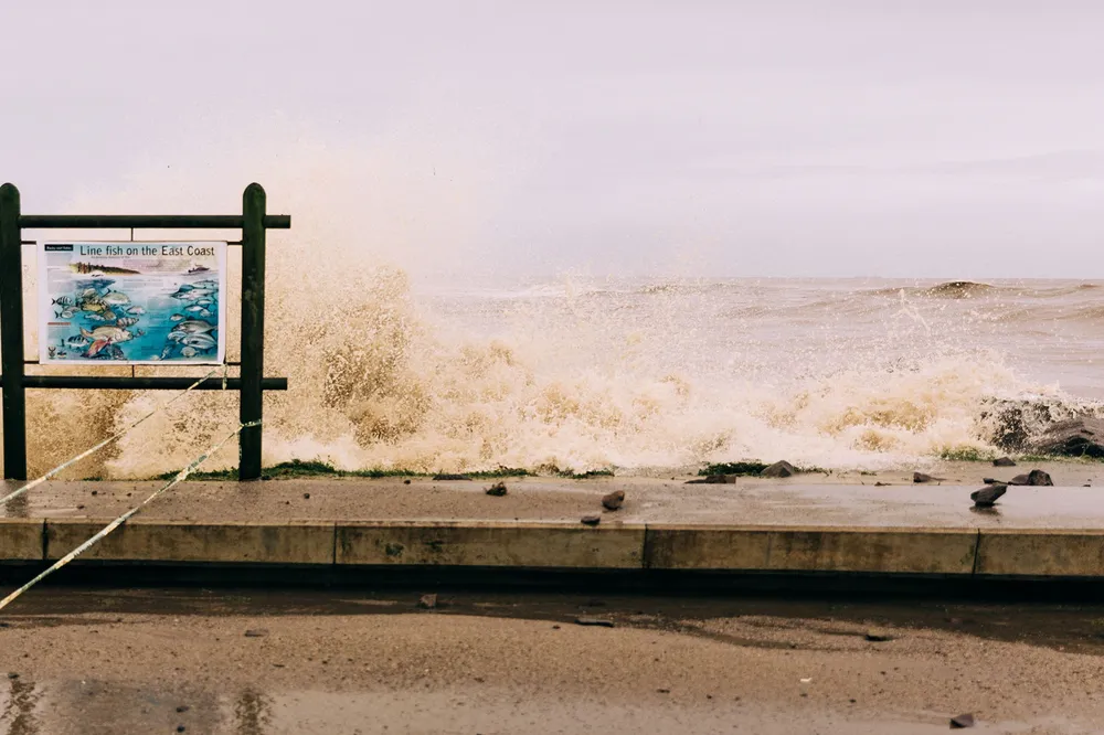 Waving goodbye: Indian Ocean rollers batter the Blue Lagoon beach in Durban, the closest major city to a block now operated by Sasol after Eni's exit