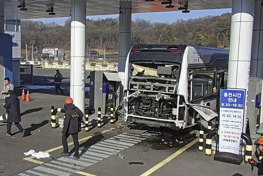 The aftermath of the bus explosion on the morning of 23 December.