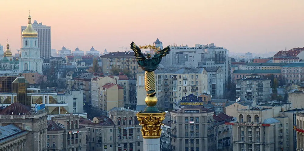 The city of Kiev, Ukraine. In the foreground is the independence monument in Maidan Square.