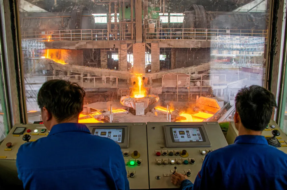 Molten copper flows into molds at a smelting plant in Wuzhou, Guangxi Zhuang Autonomous Region in China.