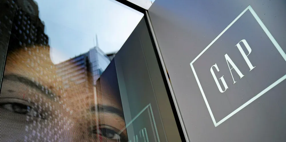 Signage for a GAP store stands near the entrance to a store in Times Square, March 1, 2019 in New York City.